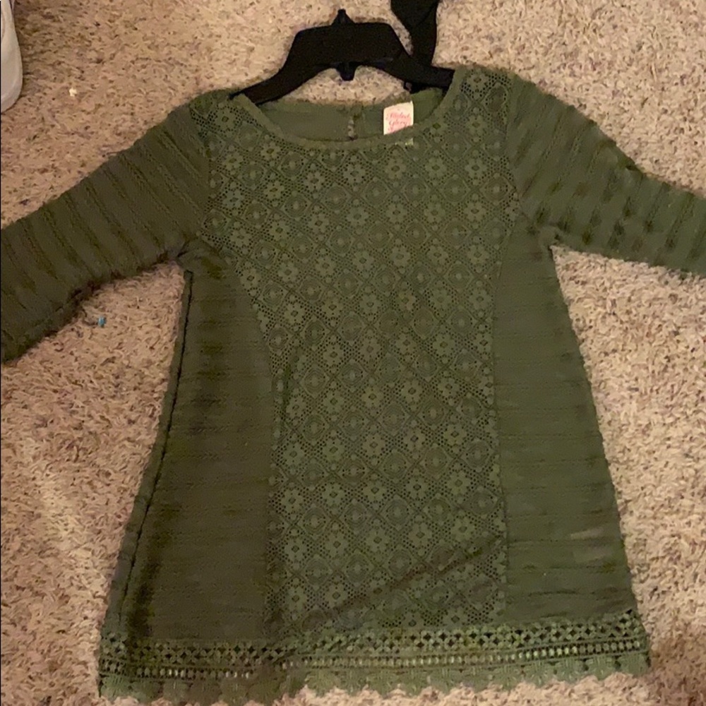 A olive green girls shirt